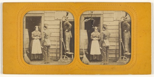 Woman talking to a man, another man standing on a chair peering at them over a door; 1855 - 1860; Hand-colored Albumen silver