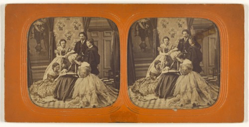 Family scene in parlor: elder woman reading to group; 1855 - 1860; Hand-colored Albumen silver print