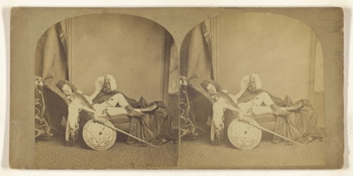 Young soldier asleep on a couch, helmet, sword, and shield in hands; about 1860; Albumen silver print