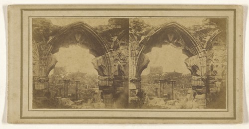 View of city through Gothic arch; 1855 - 1860; Albumen silver print