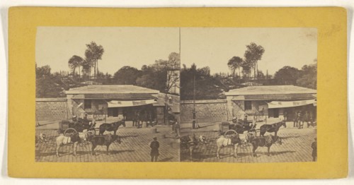 Horse-drawn wagons on a cobblestone street; about 1860; Albumen silver print