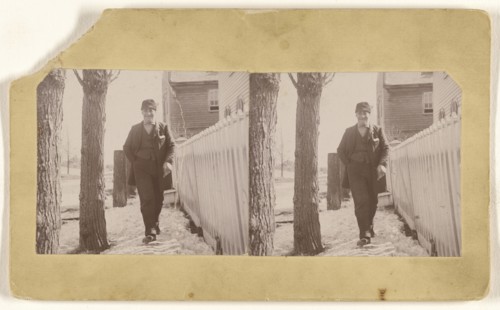 Elder man posed near white picket fence, probably at Oostburg, Wisconsin; John Zierer, American, active Wisconsin 1920s)