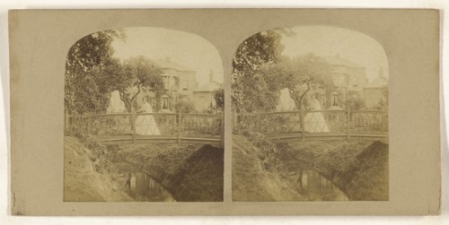 Woman crossing footbridge over stream; British; about 1860; Albumen silver print