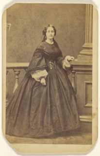 woman in long dress, standing; Edward S. Dunshee, American, active 1850s - 1890s, about 1870; Albumen silver print