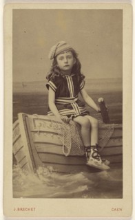 Little girl in a studio setting sitting on a rowboat; Jules Brechet, French, active Caen, France 1860s, 1864 - 1866; Albumen