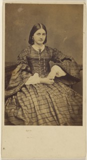 Young woman in striped dress, seated; 1860s; Albumen silver print
