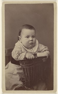 Baby posed in chair; Alexander Hesler, American, born Canada, 1823 - 1895, 1870s; Albumen silver print