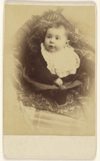 Baby in a basket; J. J. Abbott; 1860s; Albumen silver print