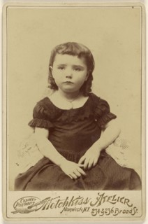 Little girl, seated; Hotchkiss, American, active Norwich, New York 1880s - 1890s, 1892; Albumen silver print