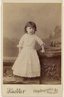 little girl, standing; Kuebler, American, active Baltimore, Maryland 1880s - 1890s, about 1880; Albumen silver print