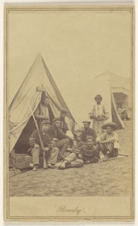 Group of seven soldiers and one black servant at a campsite; Mathew B. Brady, American, about 1823 - 1896, about 1862; Albumen