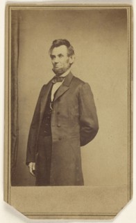 Abraham Lincoln standing with one arm behind his back; Studio of Mathew B. Brady, American, about 1823 - 1896, about 1864