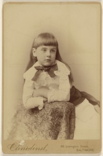 little girl posed against a chair back; Barnett M. Clinedinst, American, active 1870s - 1880s, about 1879; Albumen silver print