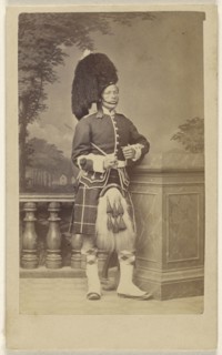 soldier in kilt and feathered bonnet; Porral, British, active Gibraltar 1860s, 1870s; Albumen silver print