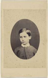 little boy, in quasi-oval style; about 1865; Albumen silver print