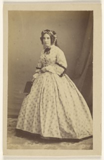 woman in white dress, standing; Bailly & Maurice; 1865 - 1870; Albumen silver print