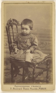 girl with extremely short hair, seated; France, French, active Paris, France 1890s, 1891; Albumen silver print