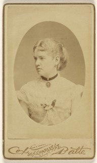 woman with cameo around her neck, in profile, printed in oval format; Cox & Batto; 1865 - 1870; Albumen silver print