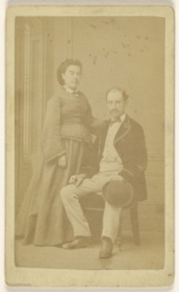 couple: woman, standing; man seated; Paul Bourgeois, French, active 1900s, about 1865; Albumen silver print