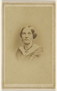 woman wearing a crucifix necklace, printed in vignette-style; J.H. Bostwick, American, active 1860s, 1865 - 1875; Albumen