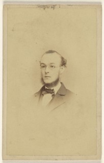 chin-bearded man wearing wire-rimmed glasses, printed in vignette-style; James Cremer & James Dillon; 1870-1875; Albumen silver