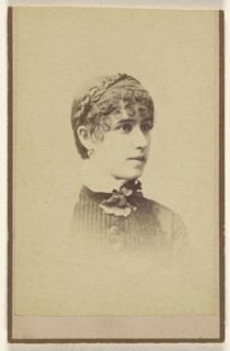 woman with curly hair, printed in vignette-style; Miller & Company; about 1880; Albumen silver print