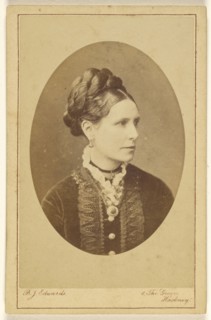 woman, in 3,4 profile, printed in oval style; B.J. Edwards, British, active 1860s, 1865 - 1870; Albumen silver print