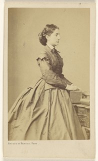French woman in profile, standing; Bayard & Bertall; about 1862; Albumen silver print