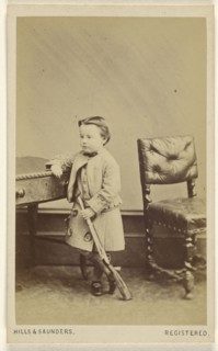 little boy standing, holding a toy rifle; Hills & Saunders, British, active about 1860 - 1920s, about 1865; Albumen silver