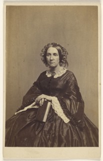 woman holding a book, seated; K.W. Beniczky, American, active New York, New York 1850s - 1860s, 1865 - 1870; Albumen silver