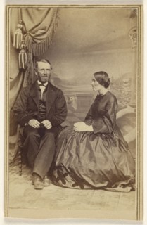bearded man and a woman, seated; Bradley & Rulofson; 1863 - 1866; Albumen silver print