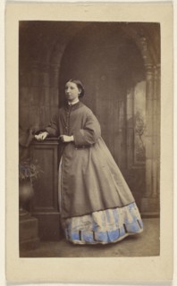 Girl standing at a dais; Ross & Thomson, Scottish, active about 1850s, Edimburgh, England; 1862-1864; Hand-colored Albumen