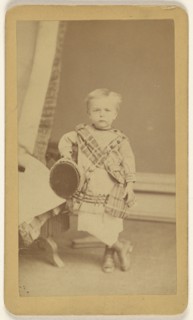 little boy standing, holding a cap; Fernando Dessaur, American, active 1880s, 1870 - 1875; Albumen silver print