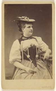 woman in native costume with hat, seated; A. Gabler, Swiss, active 1860s - 1890s, about 1876; Albumen silver print