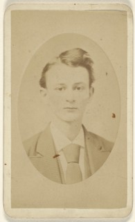 young man, printed in quasi-oval style; New York Photograph Room; 1865 - 1875; Albumen silver print