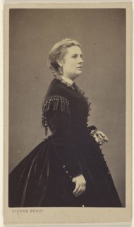 woman wearing a dark dress, standing, in profile; Pierre Petit, French, 1832 - 1909, 1865 - 1870; Albumen silver print