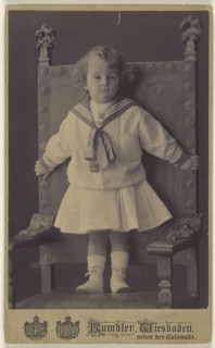 little girl standing in an ornate chair; Rumbler, German, active Wiesbäden, Germany 1860s - 1870s, 1875 - 1880; Carbon or