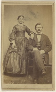 couple: woman standing holding a book and a man with moustache seated; J.W. Smith, American, active Lewistown, Pennsylvania