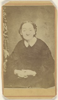 older woman with hands clasped, seated; E. Murphy & Brother; 1870 - 1875; Albumen silver print