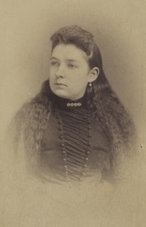 woman with long wavy hair, printed in vignette-style; Mayhew Brothers; 1870 - 1875; Albumen silver print