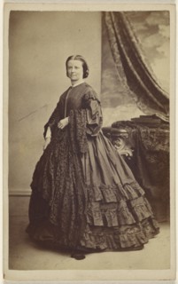 woman wearing a long dark dress, standing; Thomas Rodger, Scottish, 1832 - 1883, 1865 - 1870; Albumen silver print