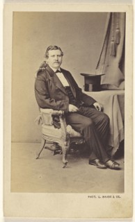 man with moustache seated, a top hat on a nearby table; L. Haase & Co; 1865 - 1870; Albumen silver print
