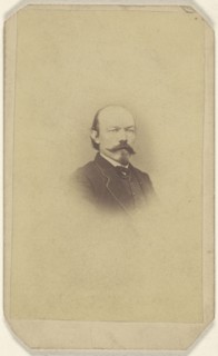 man with handlebar moustache and goatee, printed in vignette-style; 1865 - 1870; Albumen silver print