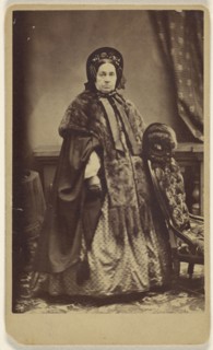 elderly woman wearing a fur coat and hat, standing; Partridge, American, active Bridgeport, Connecticut 1870s - 1890s, 1865