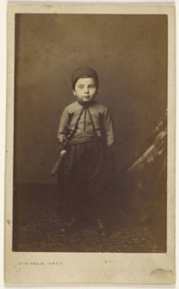little boy in native costume, standing; Robert Jefferson Bingham, British, 1824 - 1870, about 1865; Albumen silver print