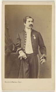 man with moustache standing, wearing a medal on his lapel; Bayard & Bertall; about 1861; Albumen silver print