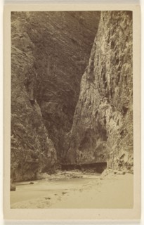 View of an enclosed mountain canyon with river and bridge; Thomas Boulanger & Cie; 1865-1875; Albumen silver print