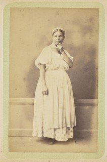 Woman posing in apron and bonnet; William Carrick, Scottish, 1827 - 1878, Russia; about 1860 - 1870; Albumen silver print