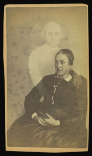 elderly woman seated, three  spirits  in the background; William H. Mumler, American, 1832 - 1884, Boston, Massachusetts