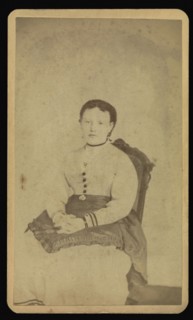 woman wearing a white dress seated with a spirit; William H. Mumler, American, 1832 - 1884, Boston, Massachusetts, United
